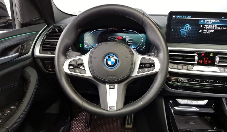 
								BMW iX3 M Sports full									